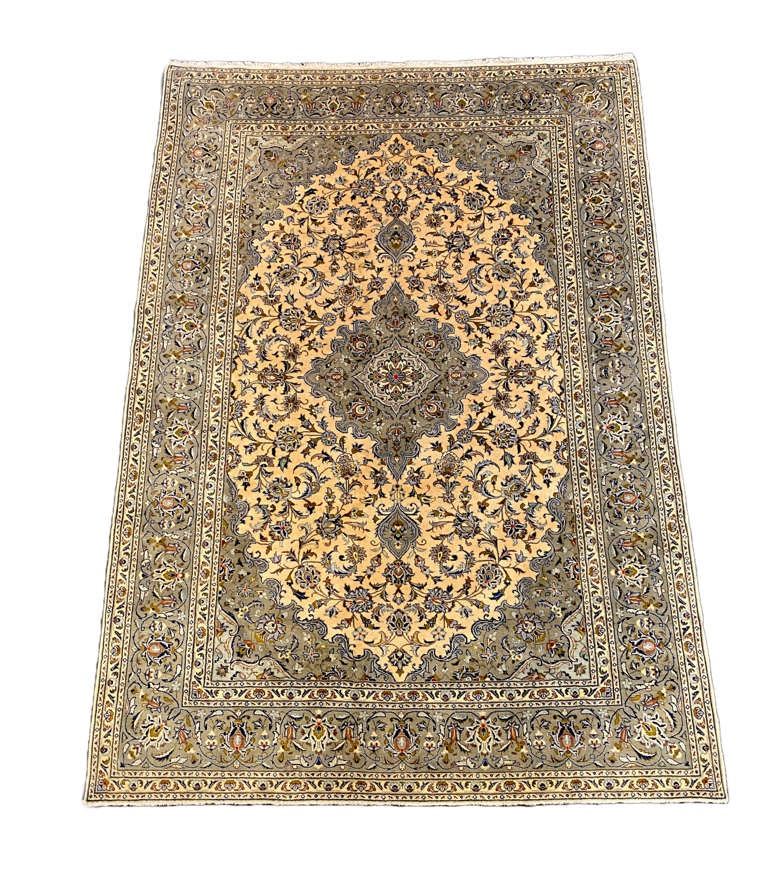 A Kashan ivory ground carpet, 355cm x 246cm